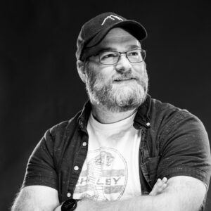 Dustin Wood, Indianapolis Indiana Dustin Wood, Photographer, graphic designer, and filmmaker looking off camera