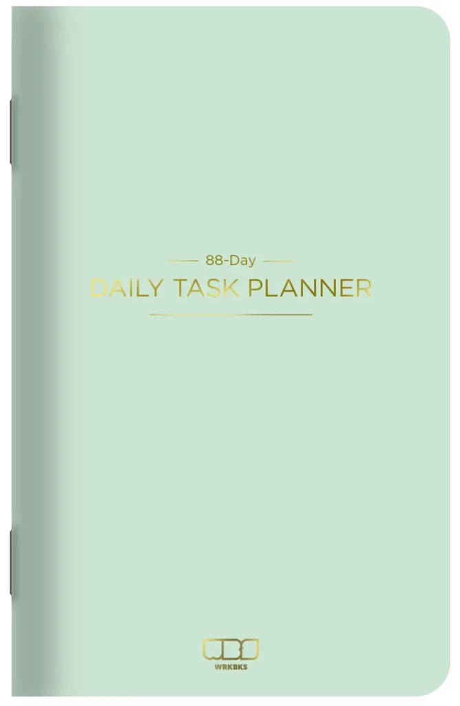 The cover of the notebook with a sea foam color cover.